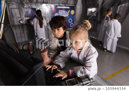 Children playing in bunker questroom 103944334