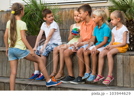 kids playing ball together kids playing ball together 103944629