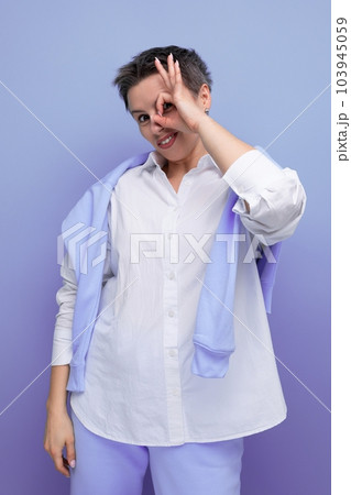 portrait of a cool positive young millennial woman in an informal setting portrait of a cool positive young millennial woman in an informal setting 103945059