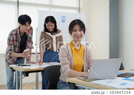 Team of ux developer and ui designer brainstorming interface wireframe design.Creative digital development agency Team of ux developer and ui designer brainstorming interface wireframe design.Creative digital development agency 103947254