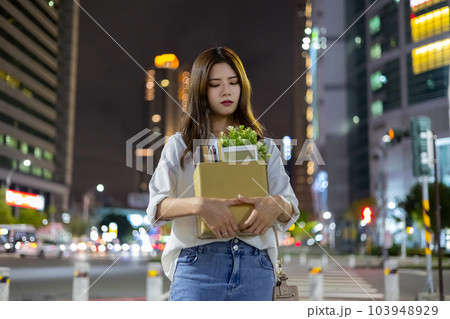 asian businesswoman get off work asian businesswoman get off work 103948929