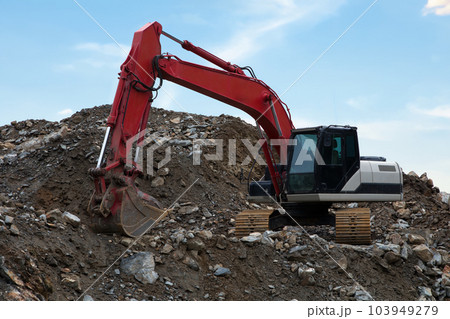 excavator digger hydraulic heavy equipment on construction site 103949279