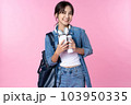 Portrait of young Asian woman student standing with smartphone coffee and backpack.College Teenager University concept. 103950335
