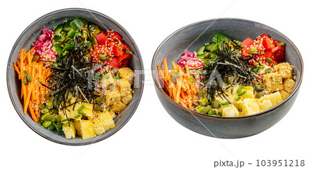 Isolated portion of tofu poke bowl with vegetables Isolated portion of tofu poke bowl with vegetables 103951218