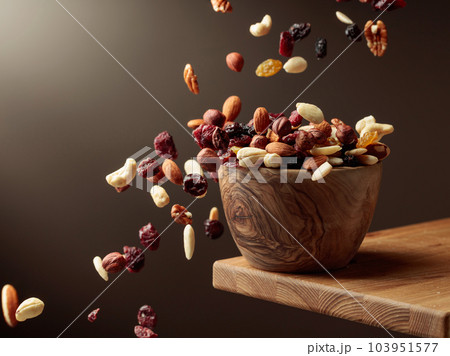 Flying dried fruits and nuts. 103951577