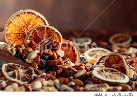 Dried fruits and nuts. Dried fruits and nuts. 103951609