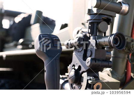 Control and optical sight of a multiple launch rocket system, close-up, military equipment 103956594