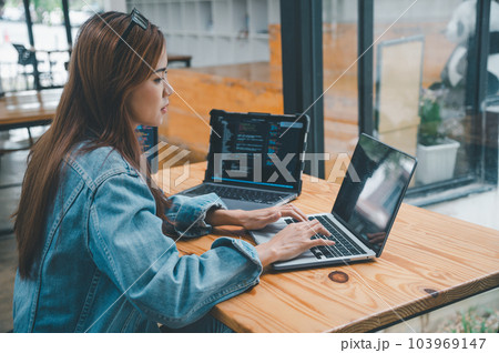 Female programmer working on coding, software development and web design.Concept technology development. 103969147