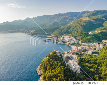 Queen's Beach in Milocer, Montenegro. Aerial view of sea waves and fantastic Rocky coast, Montenegro. drone Queen's Beach in Milocer, Montenegro. Aerial view of sea waves and fantastic Rocky coast, Montenegro. drone 103971685