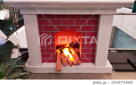 Artificial or fake fireplace made from stereo foam material for decoration. Artificial or fake fireplace made from stereo foam material for decoration. 103975400