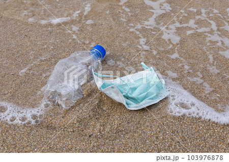 marine litter, ocean plastics and masks 103976878