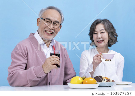 active young senior korean asian couple having teatime active young senior korean asian couple having teatime 103977257