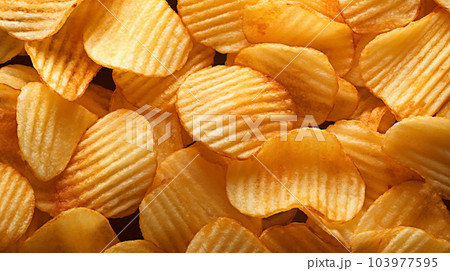 Delicious crispy potato chips, famous snack, fat food, wallpaper, texture, for banner, flyer 103977595