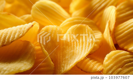 Delicious crispy potato chips, famous snack, fat food, wallpaper, texture, for banner, flyer 103977607