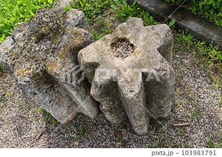 Stone gears from an ancient mechanism used in mill Stone gears from an ancient mechanism used in mill 103983791