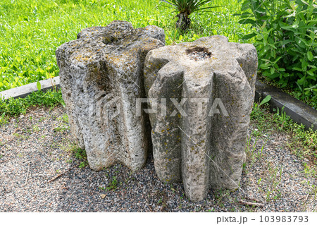 Stone gears from an ancient mechanism used in mill Stone gears from an ancient mechanism used in mill 103983793