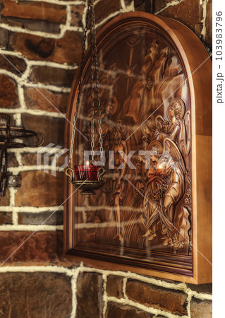 Three-dimensional icon on a Christian theme carved from wood 103983796