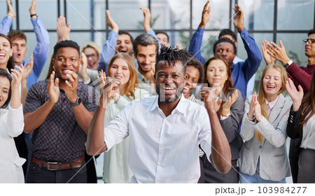 large international group of happy people applauding together large international group of happy people applauding together 103984277