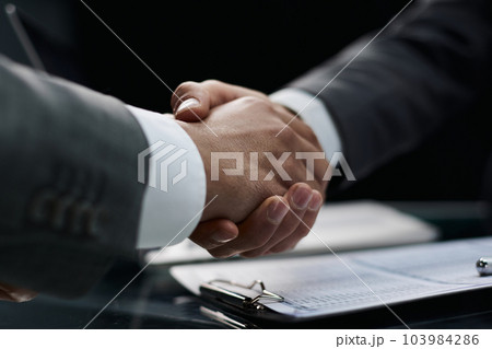 close up. handshake of business people in the office close up. handshake of business people in the office 103984286