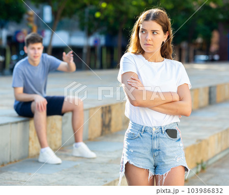 Guy tries to meet girl on city street Guy tries to meet girl on city street 103986832