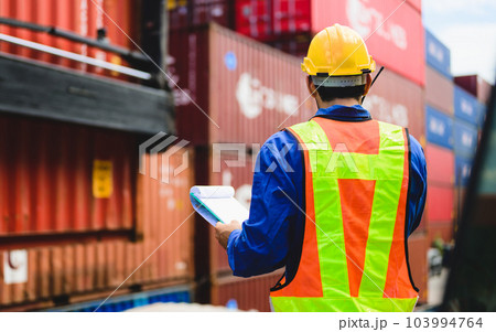 Industrial engineer worker working at overseas shipping container yard 103994764