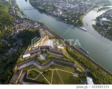 Aerial Drone Shot of Ehrenbreitstein Fortress on the river rhine in Koblenz in evening, Rheinland-Pfalz, Germany Aerial Drone Shot of Ehrenbreitstein Fortress on the river rhine in Koblenz in evening, Rheinland-Pfalz, Germany 103995155