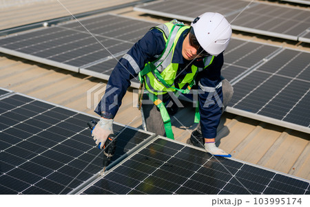 Professional engineer technician with safety helmet checking system Professional engineer technician with safety helmet checking system 103995174