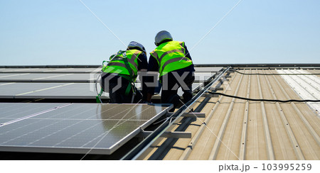 Professional engineer technician with safety helmet checking system Professional engineer technician with safety helmet checking system 103995259