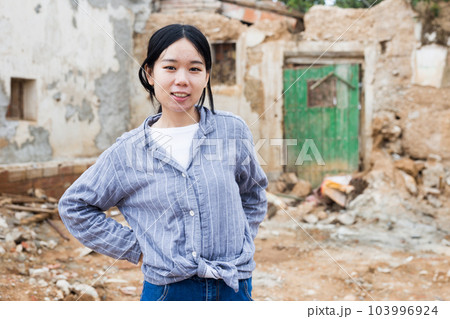 Chinese girl near building 103996924