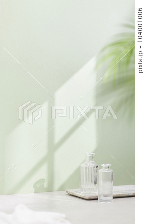 Vases and objects on the table in a warm room with sunlight coming in 104001006