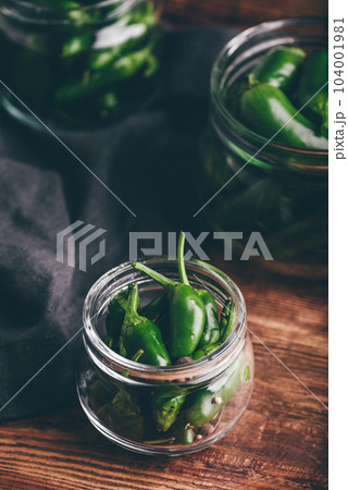 Canned Jalapeno Peppers, Garlic And Glass Jars 104001981