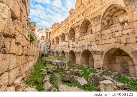 Ancient walls of Roman temple of Bacchus with surrounding ruins and blue sky in the background, Beqaa Valley, Baalbeck, Lebanon Ancient walls of Roman temple of Bacchus with surrounding ruins and blue sky in the background, Beqaa Valley, Baalbeck, Lebanon 104008122