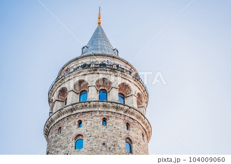 Istanbul city skyline in Turkey, Beyoglu district old houses with Galata tower 104009060