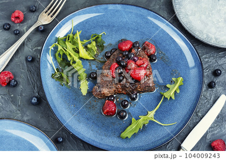 Fried beef fillet medallion steak. Fried beef fillet medallion steak. 104009243