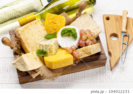 Various cheese and white wine 104012231