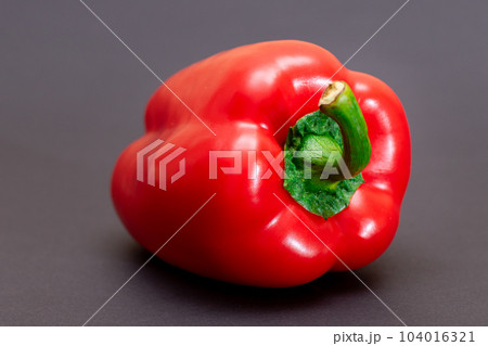 Red Bell Pepper on Black Background Red Bell Pepper on Black Background 104016321