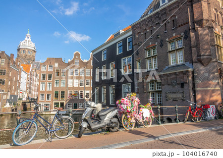 Bicycles and Scooter on the Amsterdam Bridge 104016740