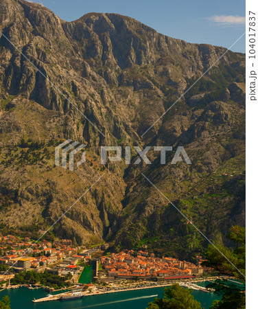View of the ancient and modern city of Kotor from the mountain hiking trail 104017837