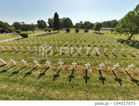 White crosses Pattern from Above. Tombs in a military cemetery in Strasbourg, France. Aerial Drone Shot White crosses Pattern from Above. Tombs in a military cemetery in Strasbourg, France. Aerial Drone Shot 104017875