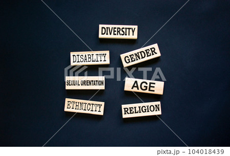 Diversity symbol. Diversity ethnicity gender age sexual orientation religion disability words written on wooden block. Beautiful black background. Equality and diversity concept. Copy space. Diversity symbol. Diversity ethnicity gender age sexual orientation religion disability words written on wooden block. Beautiful black background. Equality and diversity concept. Copy space. 104018439