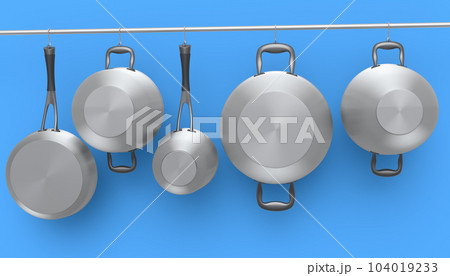Set of stewpot, frying pan and chrome plated cookware hanging on shelf on blue 104019233