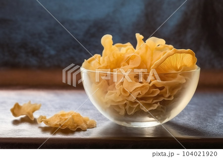 A bowl of dried mushrooms placed on a table. Generative AI 104021920