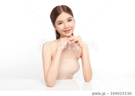 Beautiful young asian woman with clean fresh skin on white background, Face care, Facial treatment, Cosmetology, beauty and spa, Asian women portrait. Beautiful young asian woman with clean fresh skin on white background, Face care, Facial treatment, Cosmetology, beauty and spa, Asian women portrait. 104025530