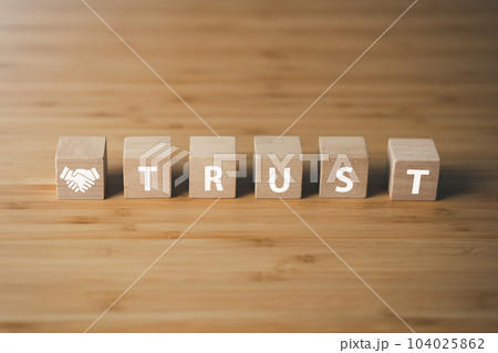 Wooden block of trust.businees achievement goal , business connection and team work concept. 104025862