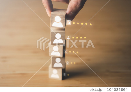 Wooden block of survey rating icon for customer satisfaction scores. customer satisfaction concept. 104025864