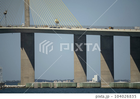 Sunshine Skyway Bridge over Tampa Bay in Florida with moving traffic. Concept of transportation infrastructure 104026835