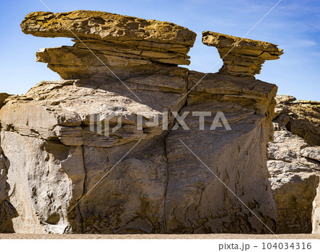 Rock formations in Bolivia at 16,000 feet elevation, carved by constant wind 104034316