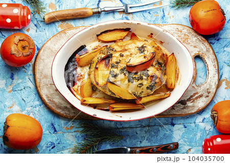Roasted or grilled whole chicken breast with fruit. Roasted or grilled whole chicken breast with fruit. 104035700