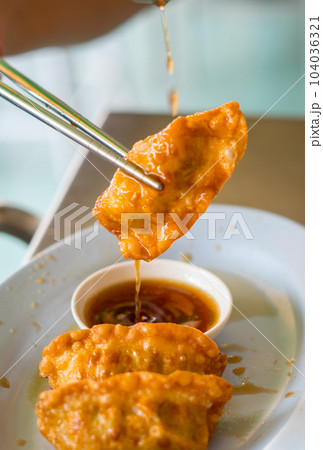 Deep fried gyoza crispy and golden colour  104036321