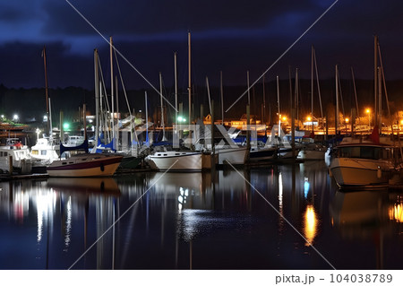 Boats in the harbor at night, neural network generated image 104038789